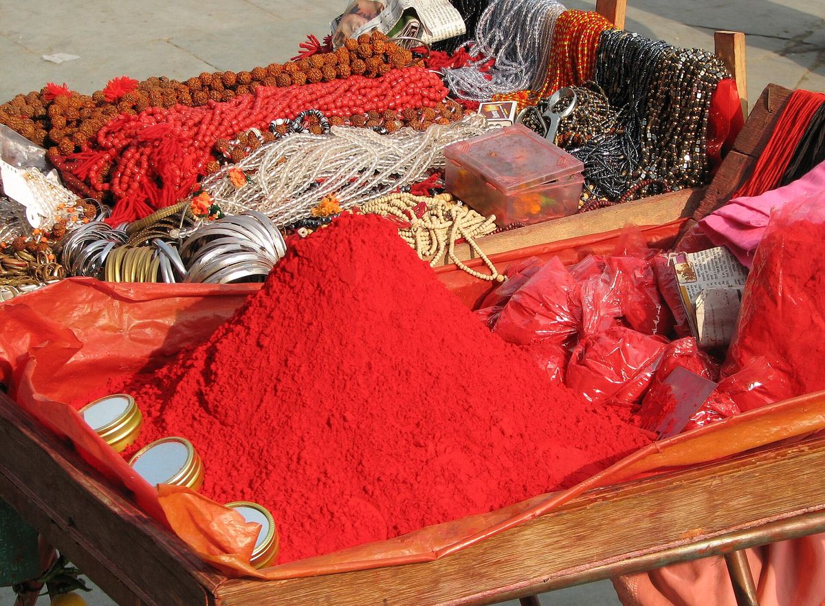 India - Haridwar - 007 - Red tikka powder & jewelry